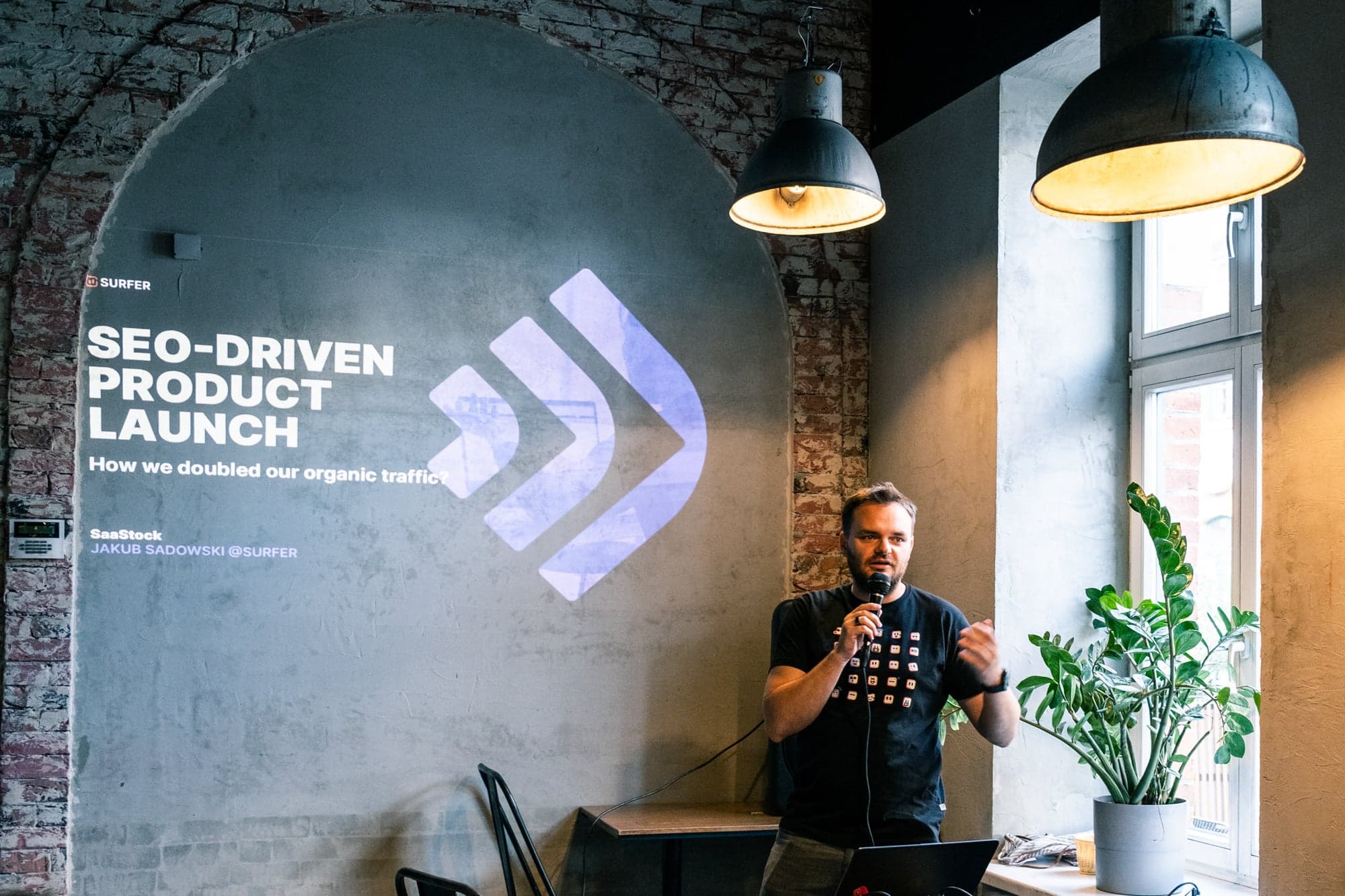 Jakub Sadowski presenting at SaaStock Local on how SEO can help launch a new SaaS product